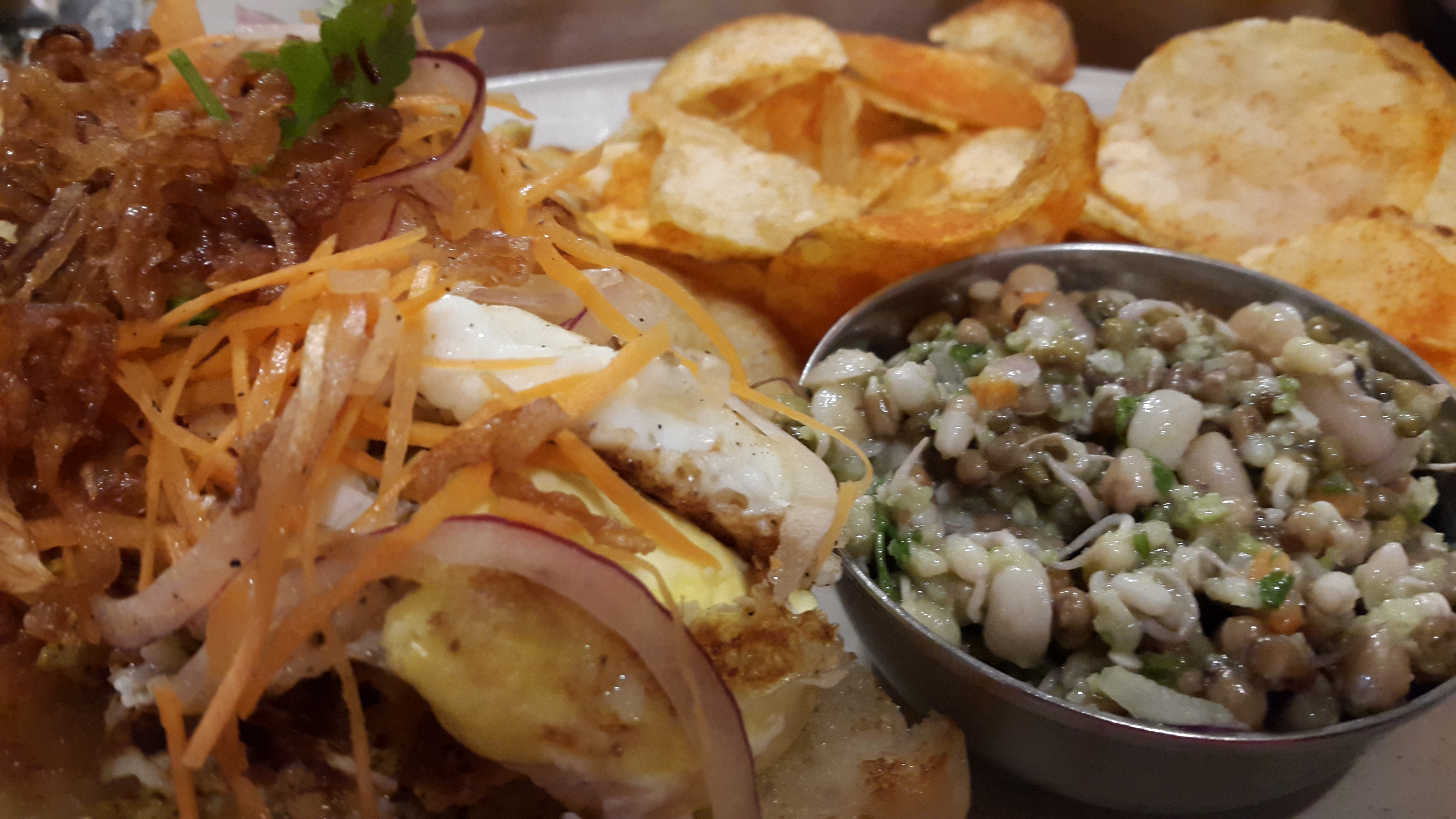 The Kasundi chicken bada pav sandwich served with fried egg and wafers (and that damn sprout salad again)