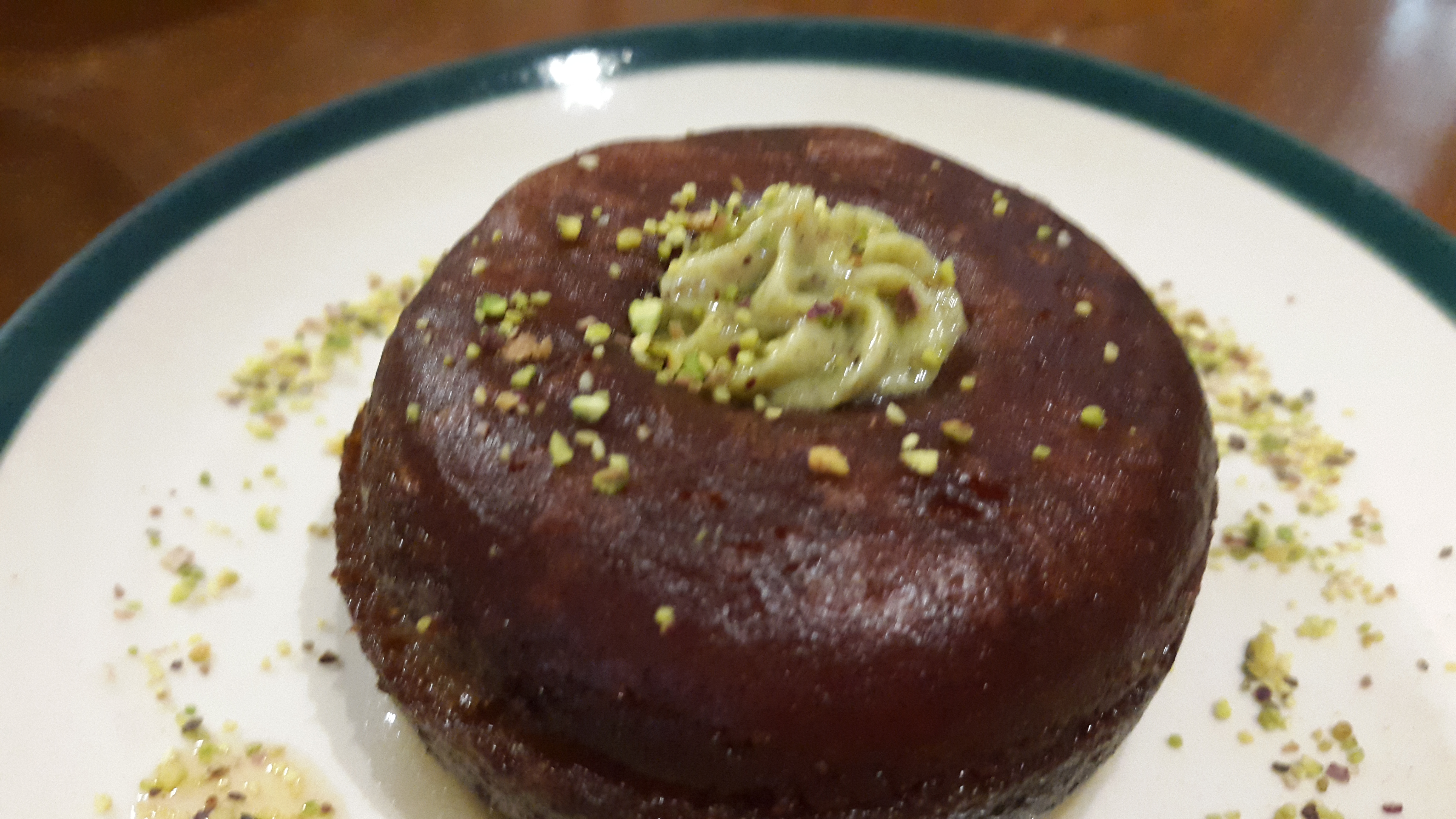 Gulab Nut aka a gulab jamun doughnut soaked in Old Monk sugar syrup. 
